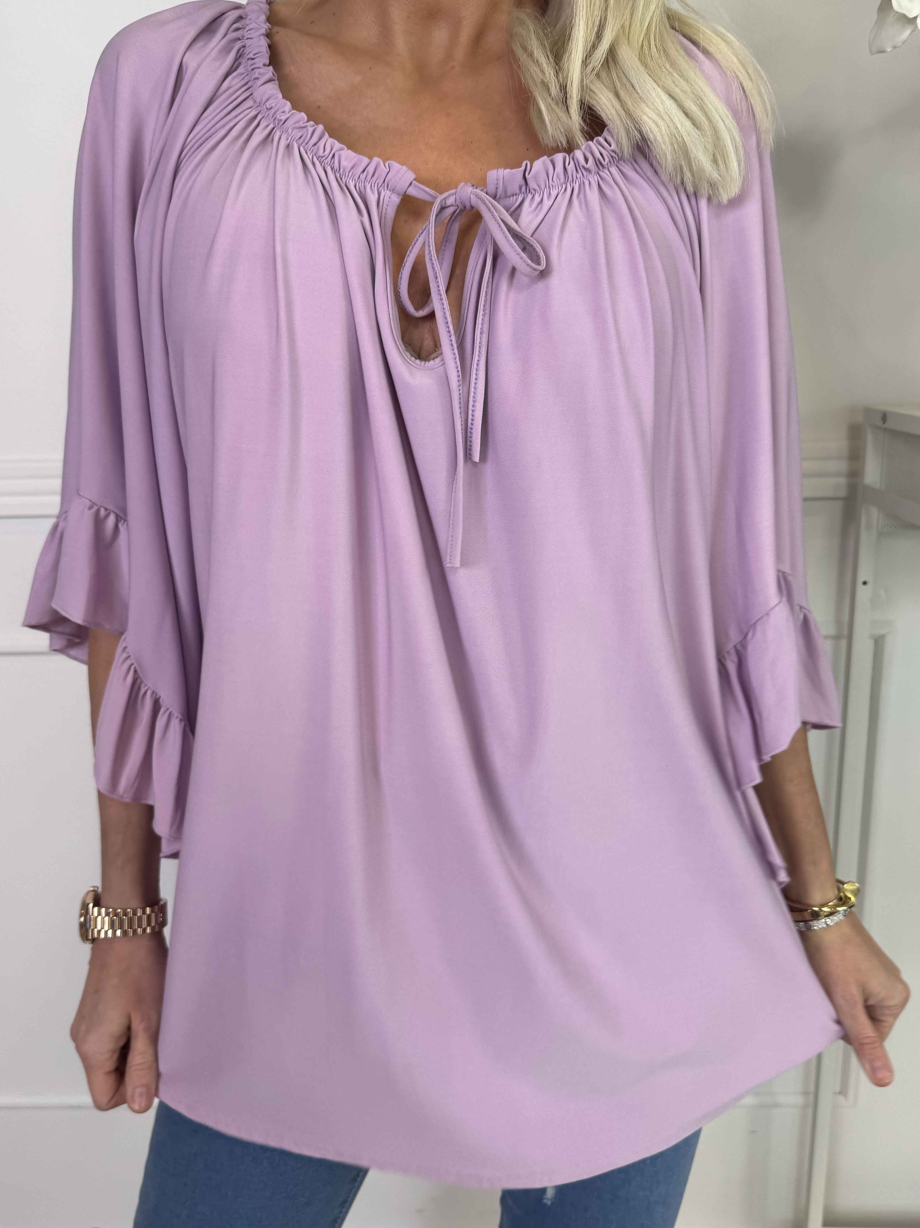 Anneli - Söt elastisk tunika med volangärmar